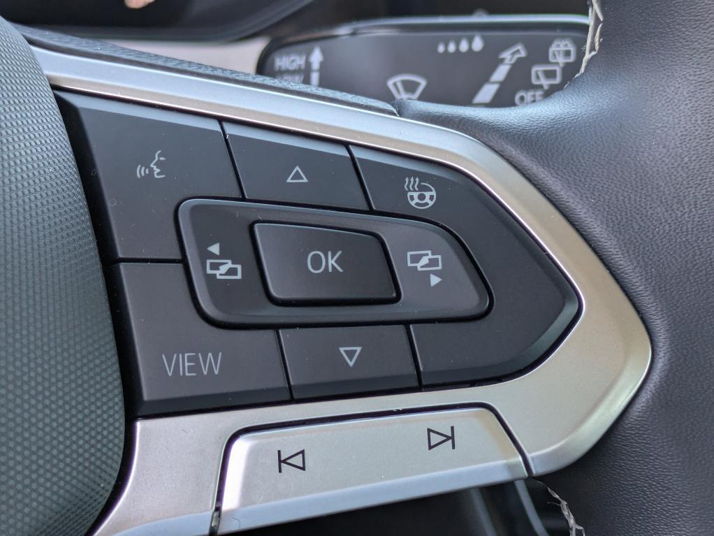 used 2024 Volkswagen Taos car, priced at $20,902