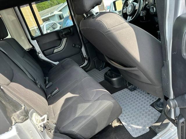 used 2015 Jeep Wrangler Unlimited car, priced at $14,995
