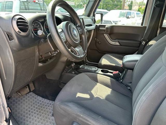 used 2015 Jeep Wrangler Unlimited car, priced at $14,995