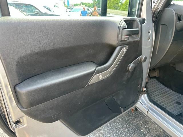 used 2015 Jeep Wrangler Unlimited car, priced at $14,995