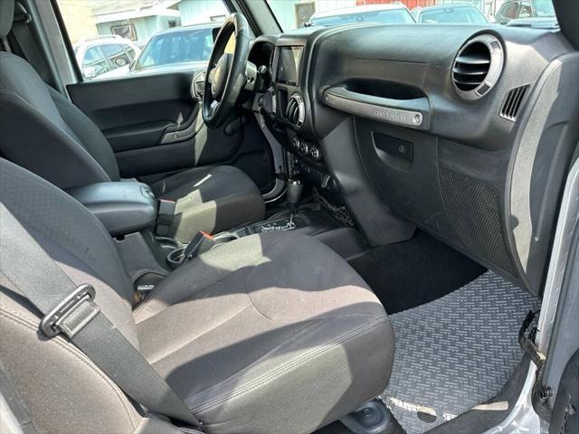 used 2015 Jeep Wrangler Unlimited car, priced at $14,995