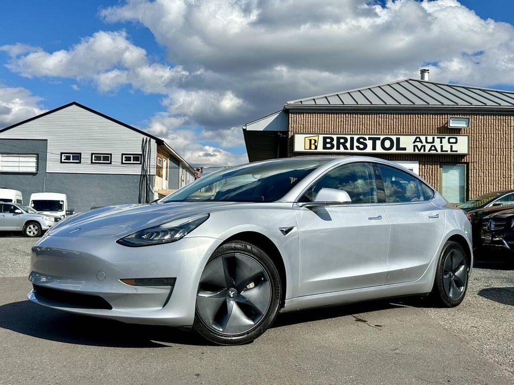 used 2018 Tesla Model 3 car, priced at $17,995
