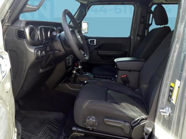 used 2023 Jeep Wrangler car, priced at $33,214