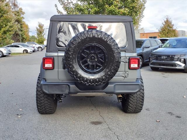 used 2023 Jeep Wrangler car, priced at $33,214