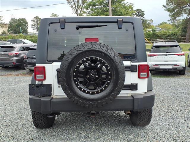 used 2016 Jeep Wrangler car, priced at $16,859