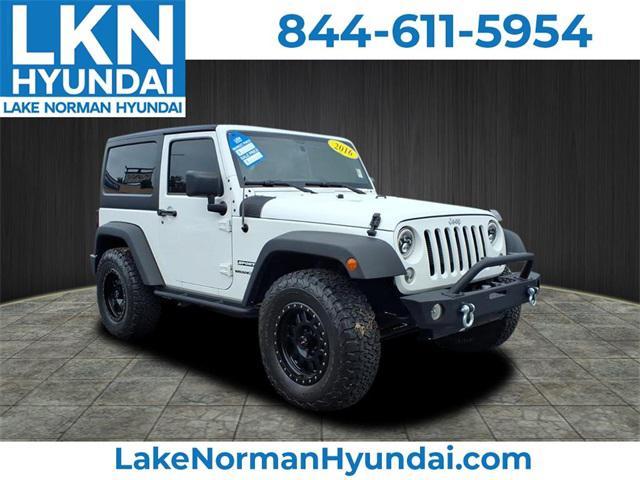 used 2016 Jeep Wrangler car, priced at $16,859