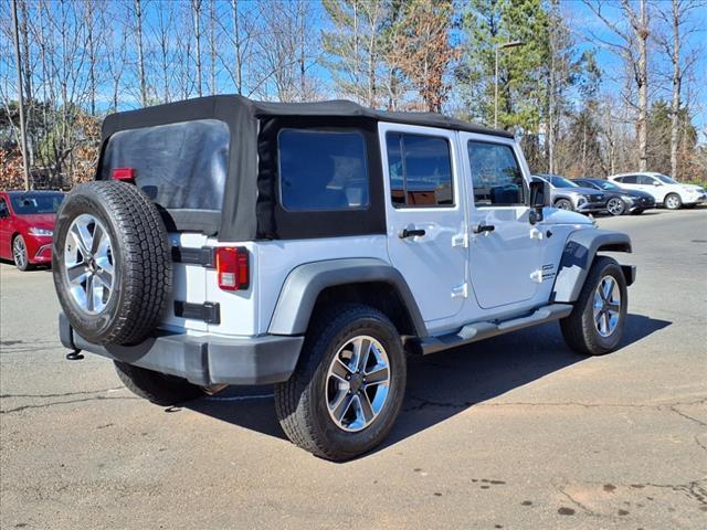 used 2015 Jeep Wrangler Unlimited car, priced at $18,928