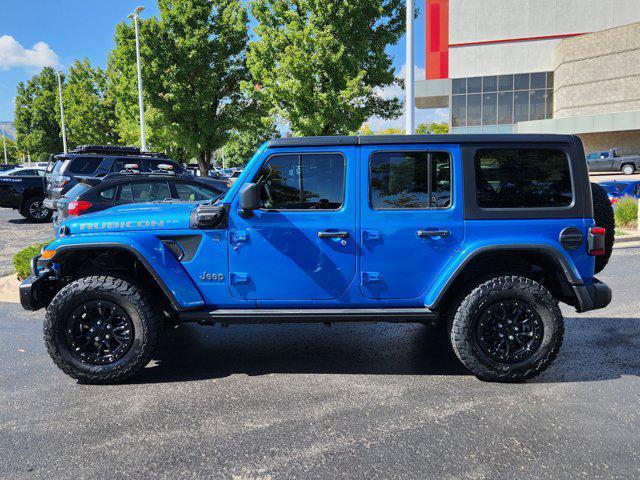 used 2023 Jeep Wrangler 4xe car, priced at $36,559