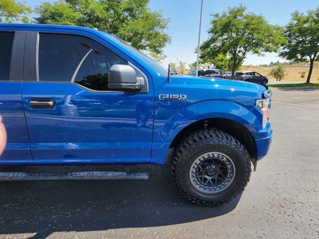 used 2018 Ford F-150 car, priced at $29,595
