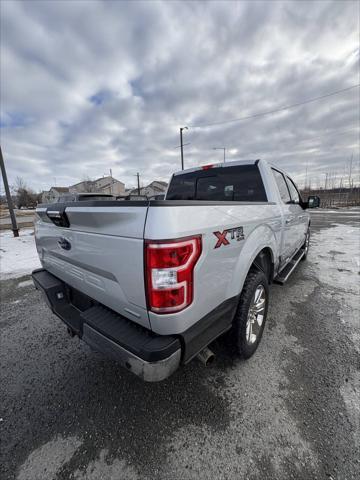 used 2018 Ford F-150 car, priced at $27,499