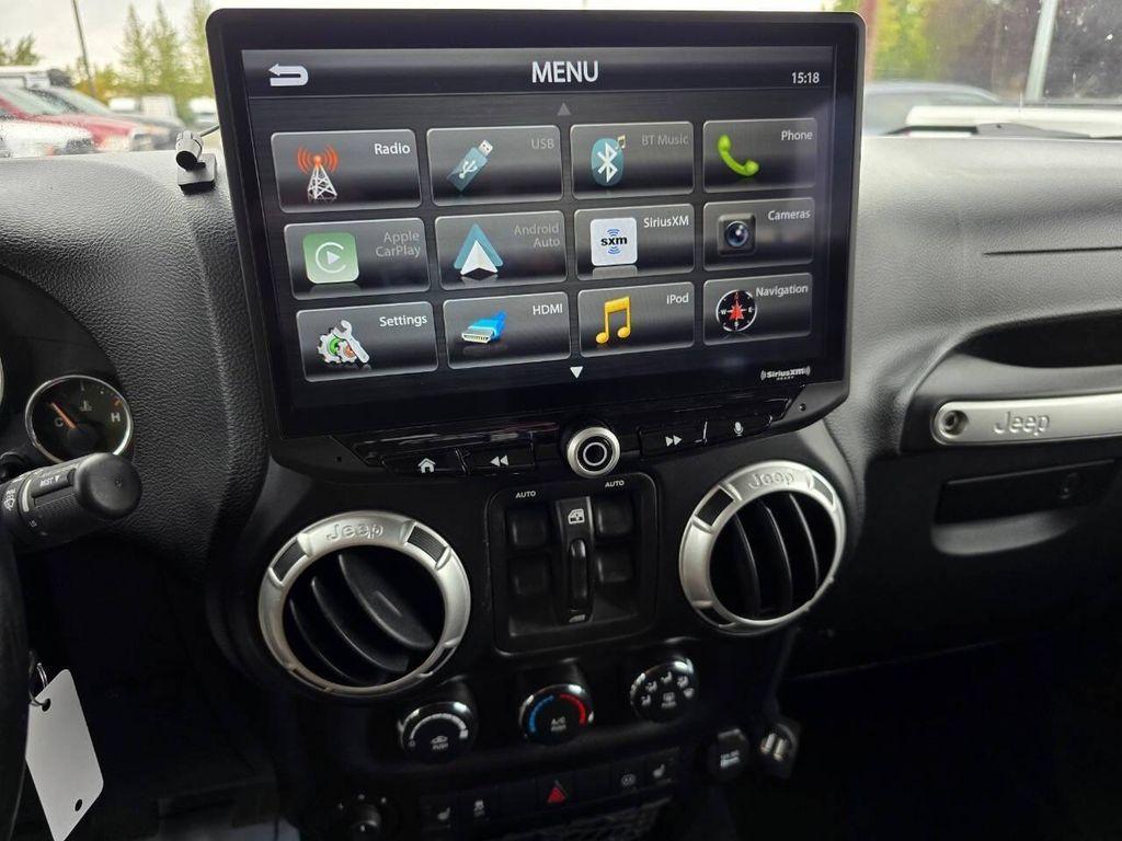 used 2011 Jeep Wrangler Unlimited car, priced at $16,355