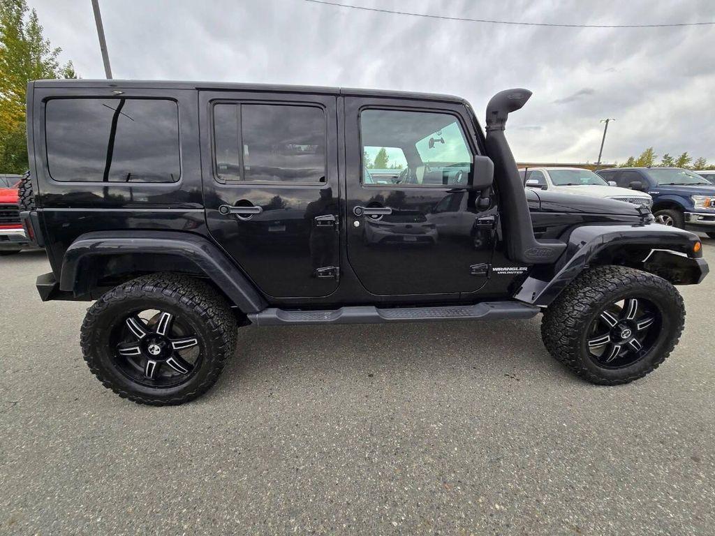 used 2011 Jeep Wrangler Unlimited car, priced at $16,355