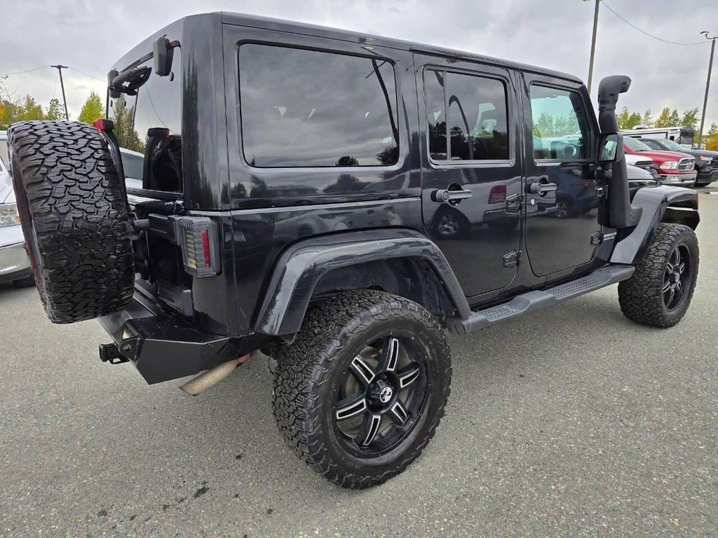 used 2011 Jeep Wrangler Unlimited car, priced at $16,355