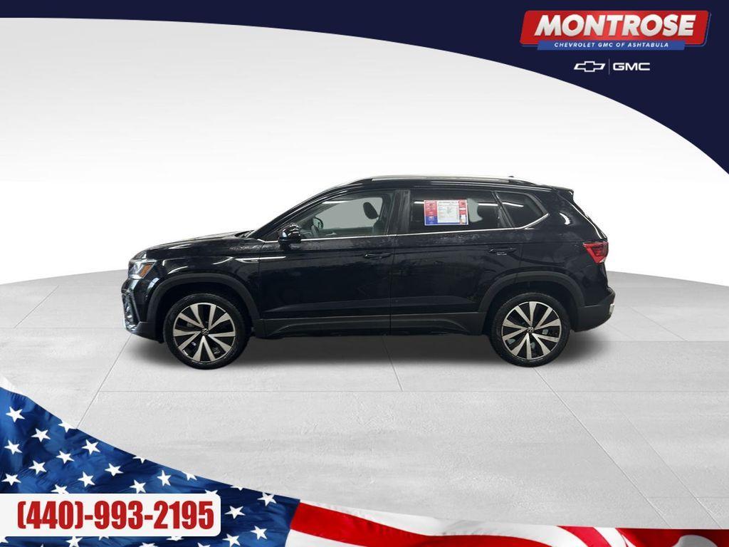 used 2023 Volkswagen Taos car, priced at $21,500