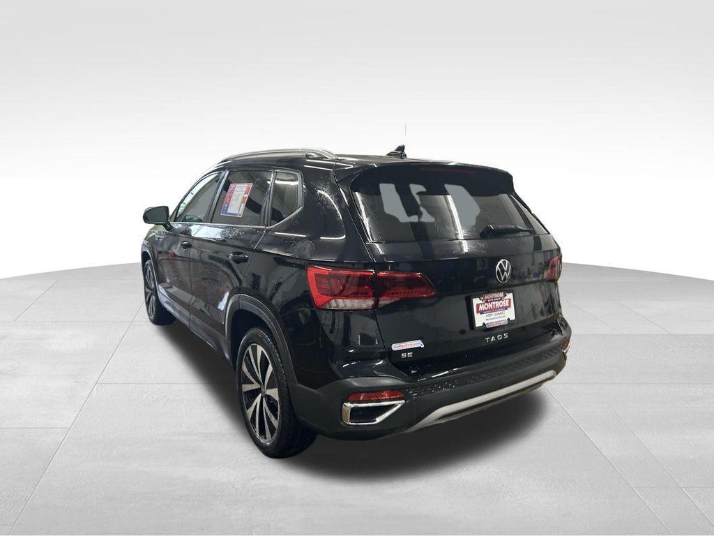 used 2023 Volkswagen Taos car, priced at $22,500