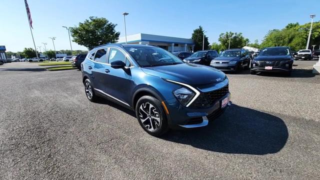 used 2023 Kia Sportage Hybrid car, priced at $28,132