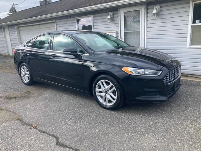 used 2015 Ford Fusion car, priced at $7,695