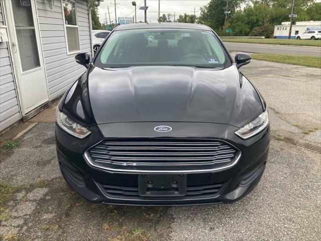 used 2015 Ford Fusion car, priced at $7,695