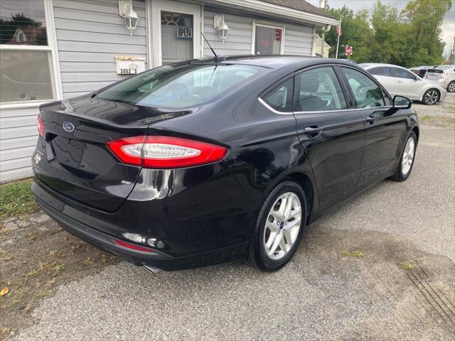 used 2015 Ford Fusion car, priced at $7,695