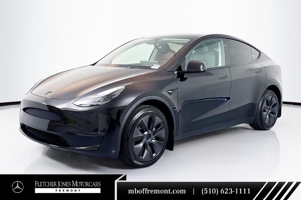 used 2025 Tesla Model Y car, priced at $39,994