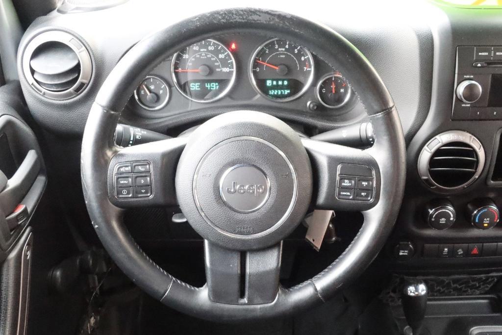 used 2015 Jeep Wrangler Unlimited car, priced at $16,998