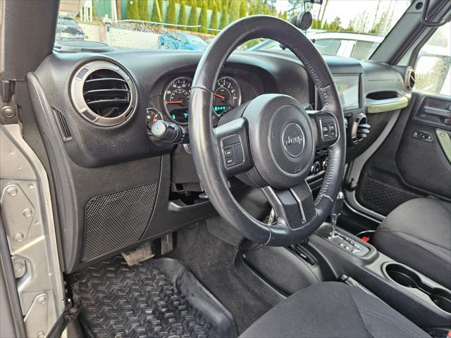 used 2015 Jeep Wrangler Unlimited car, priced at $20,585