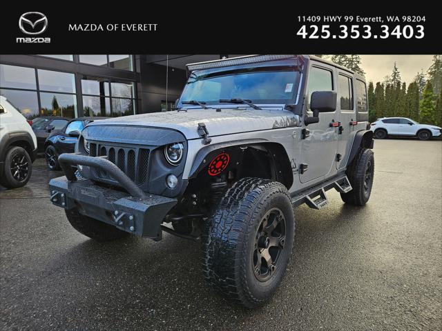 used 2015 Jeep Wrangler Unlimited car, priced at $20,585