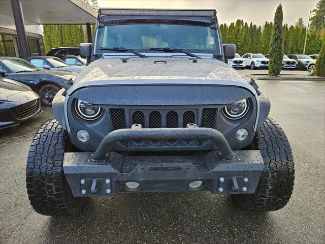 used 2015 Jeep Wrangler Unlimited car, priced at $20,585