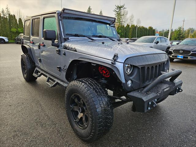 used 2015 Jeep Wrangler Unlimited car, priced at $20,585