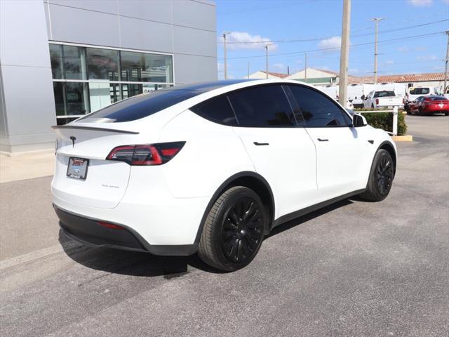 used 2023 Tesla Model Y car, priced at $35,880