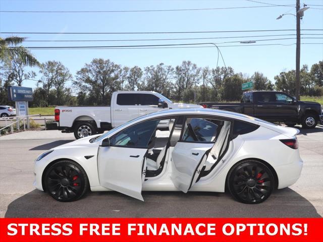 used 2023 Tesla Model 3 car, priced at $34,990