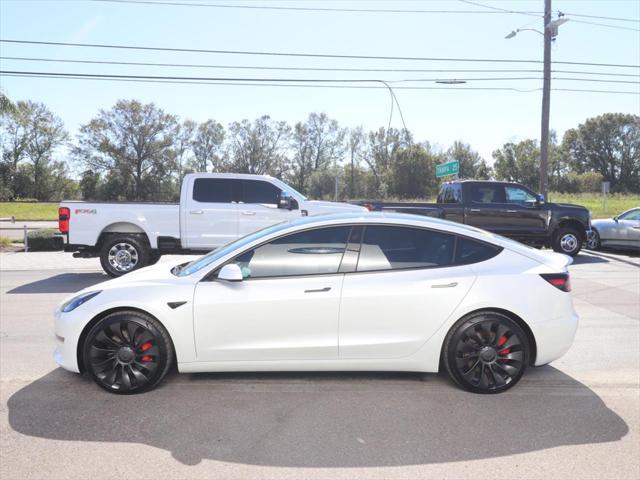 used 2023 Tesla Model 3 car, priced at $34,990