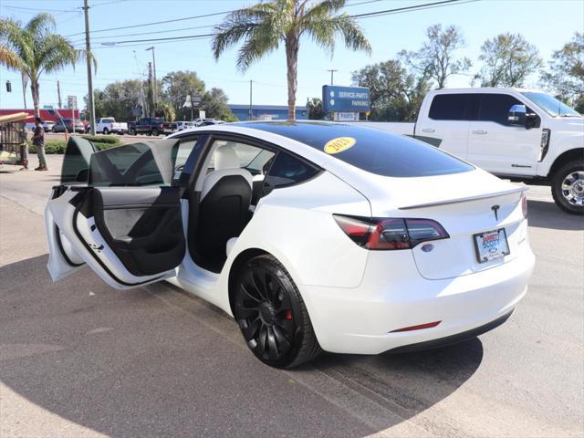 used 2023 Tesla Model 3 car, priced at $34,990