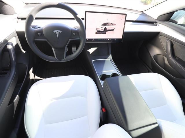 used 2023 Tesla Model 3 car, priced at $34,990