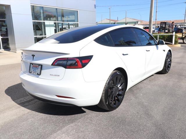 used 2023 Tesla Model 3 car, priced at $34,990