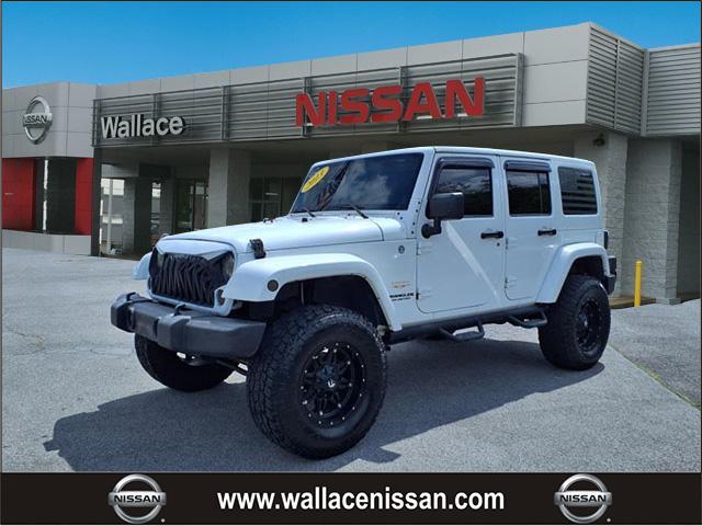 used 2013 Jeep Wrangler Unlimited car, priced at $15,998