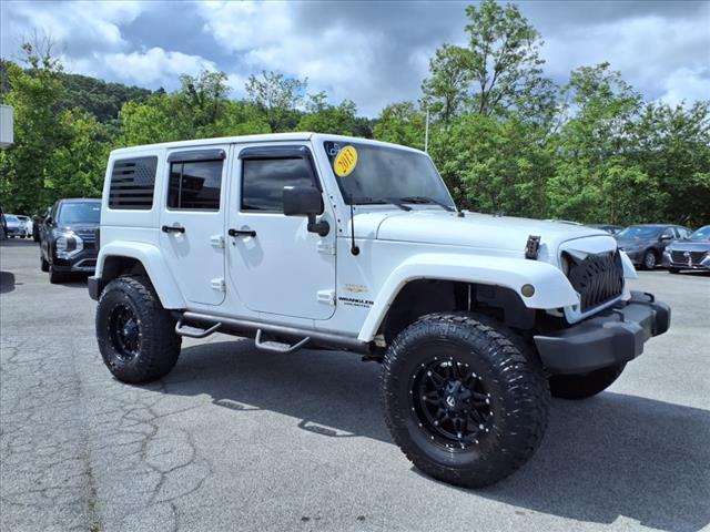 used 2013 Jeep Wrangler Unlimited car, priced at $15,998