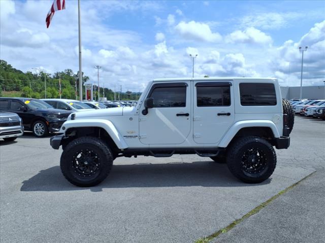 used 2013 Jeep Wrangler Unlimited car, priced at $15,998