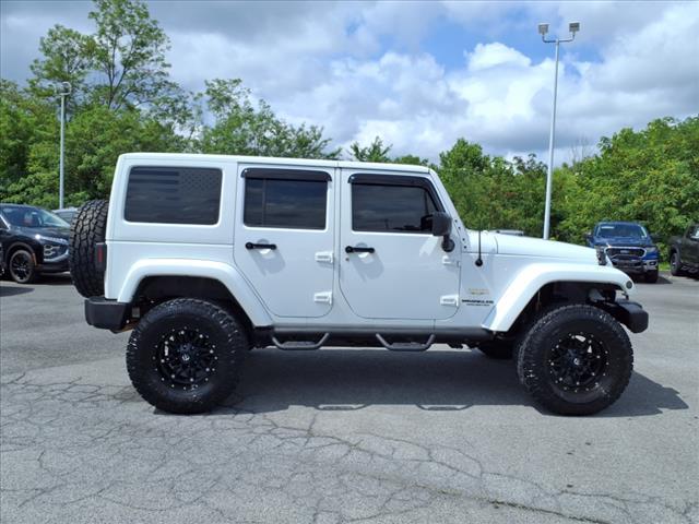 used 2013 Jeep Wrangler Unlimited car, priced at $15,998