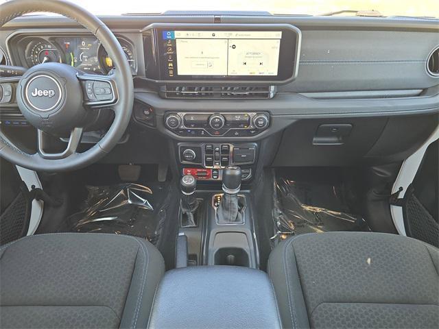 used 2024 Jeep Wrangler 4xe car, priced at $37,987