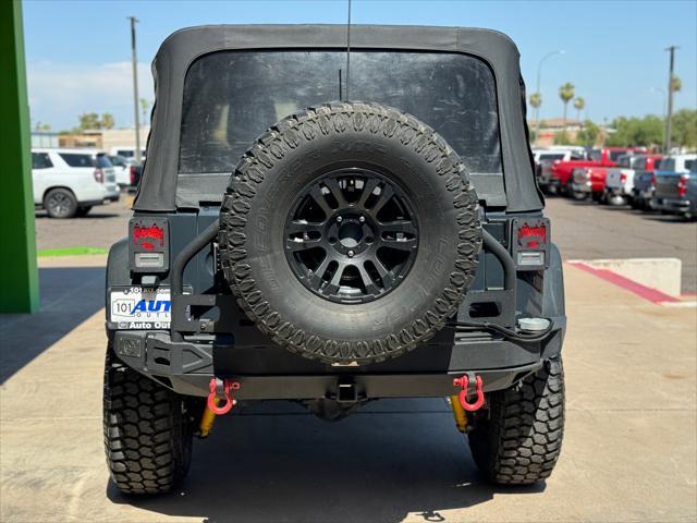 used 2016 Jeep Wrangler Unlimited car, priced at $30,988