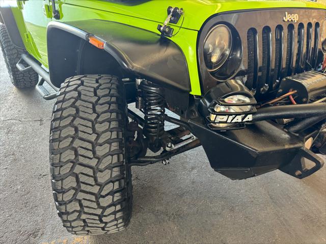 used 2013 Jeep Wrangler Unlimited car, priced at $19,988