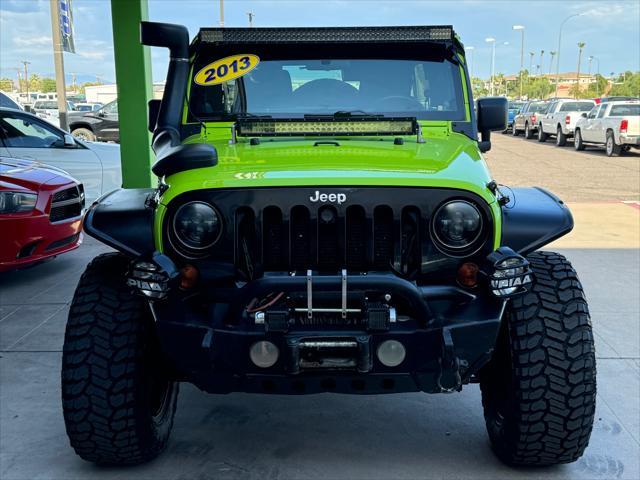 used 2013 Jeep Wrangler Unlimited car, priced at $19,988