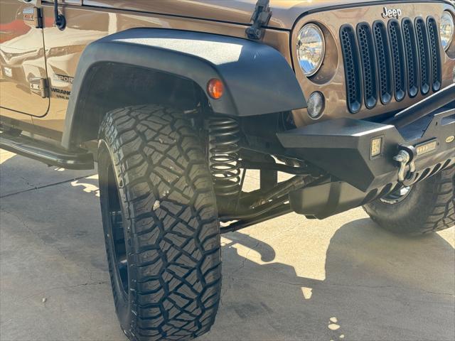 used 2015 Jeep Wrangler Unlimited car, priced at $18,989