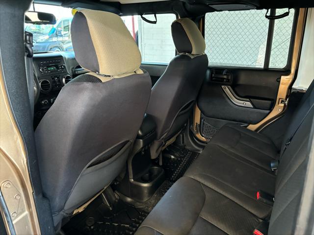 used 2015 Jeep Wrangler Unlimited car, priced at $18,989