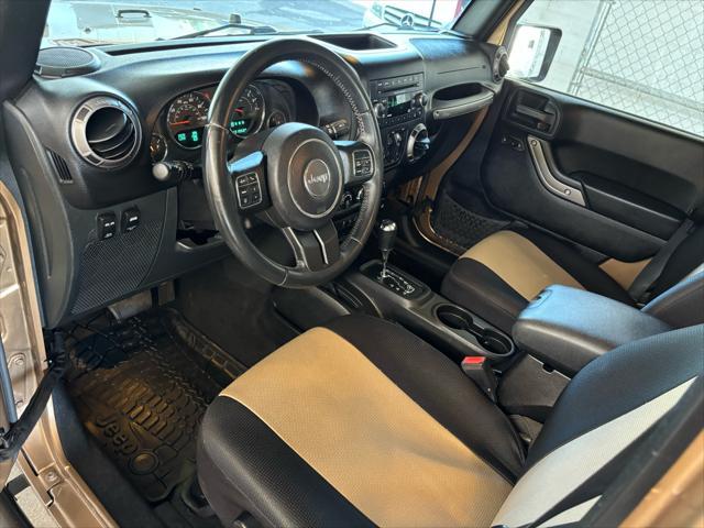 used 2015 Jeep Wrangler Unlimited car, priced at $18,989