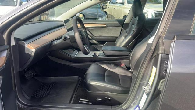 used 2023 Tesla Model 3 car, priced at $25,999