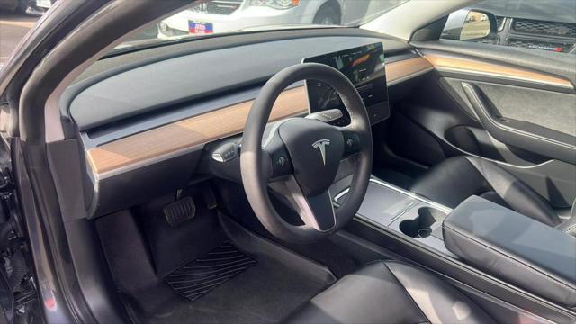 used 2023 Tesla Model 3 car, priced at $25,999