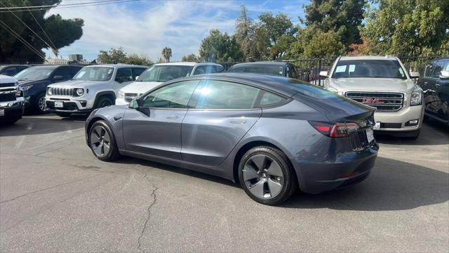 used 2023 Tesla Model 3 car, priced at $25,999