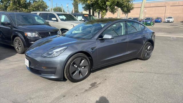 used 2023 Tesla Model 3 car, priced at $25,999